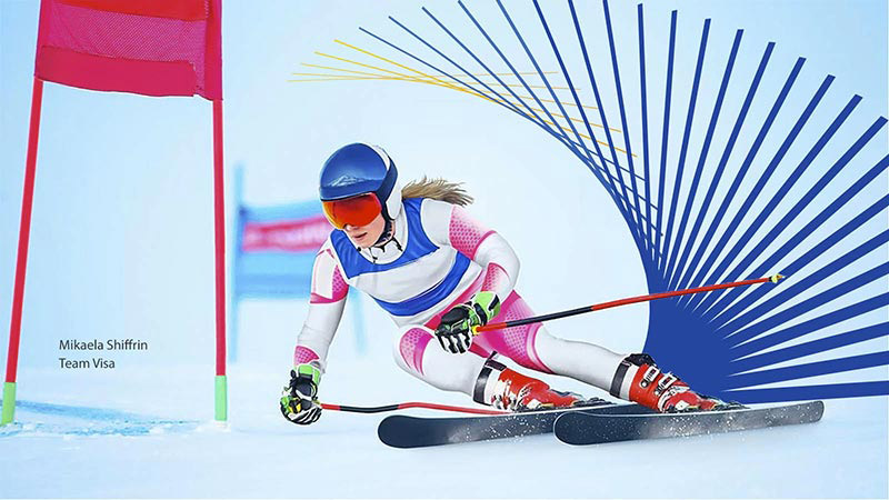 sponsorship-skier-800x450 Olympian and Team Visa member Mikaela Shiffrin skis down a slope and around a flag.
