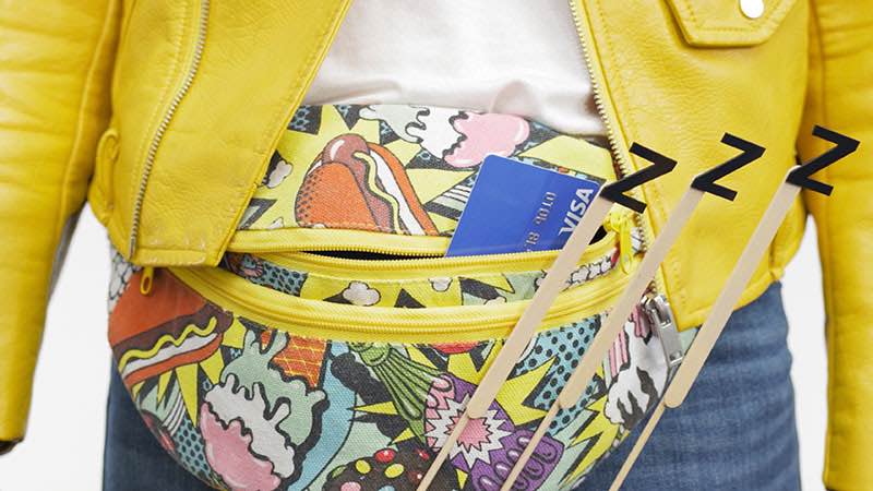 Contactless card asleep in traveler’s fanny pack. Contactless card asleep in traveler’s fanny pack.