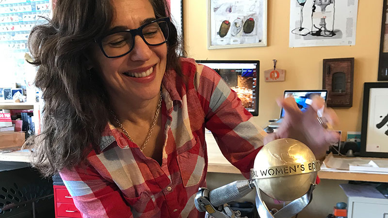 Trophy designer Lisa Issenberg smiling while making the trophy. Trophy designer Lisa Issenberg smiling while making the trophy.