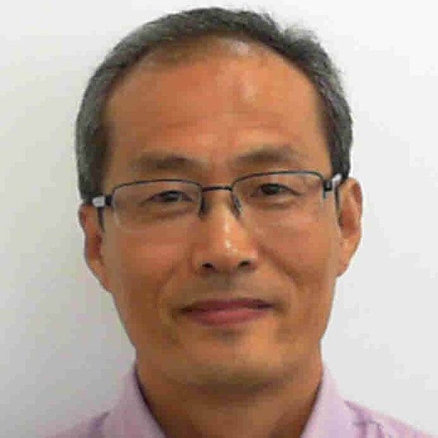 Headshot of Liang Wang, Visa Research scientist.