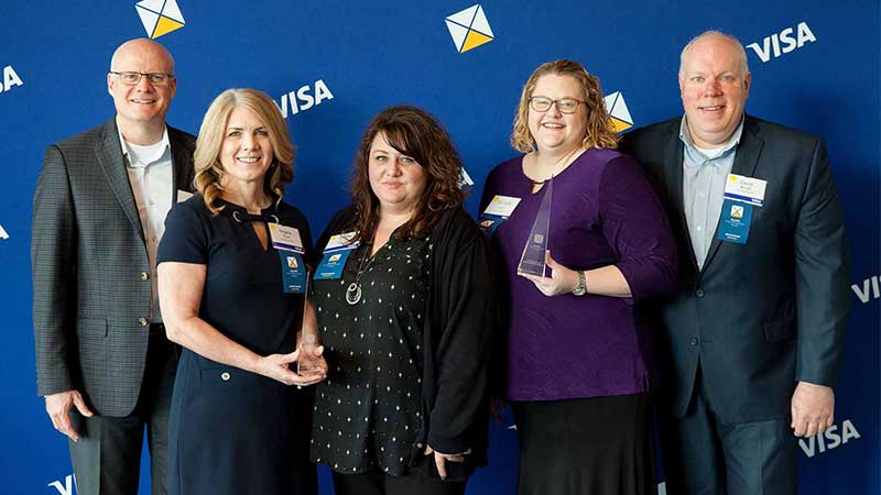Three female and two male award winners.  