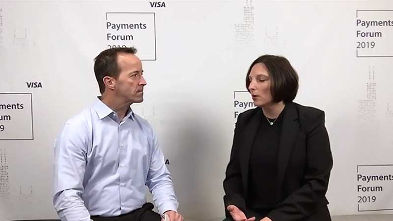 April Clobes talking to an interviewer at the Visa Payments Forum 2019.