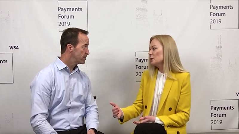 Mary Ann Reilly talking to an interviewer at the Visa Payments Forum 2019.