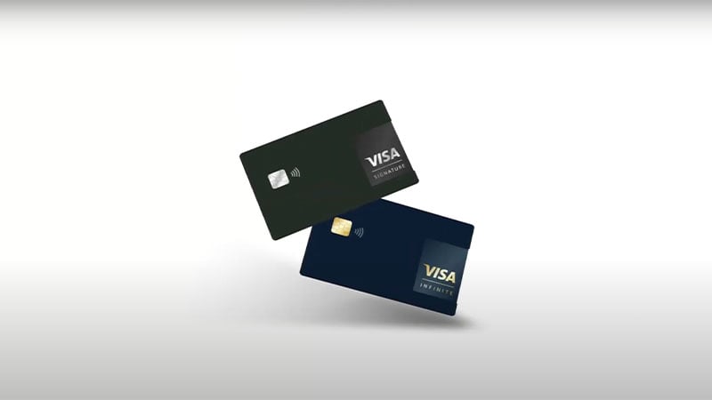 Two chip-enabled Visa credit cards, one Signature, one Infinite, with Visa logos and tap to pay indicators.