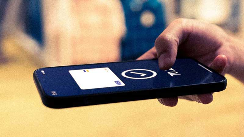 Virtual card payment using a cellphone showing image of Visa-branded card.